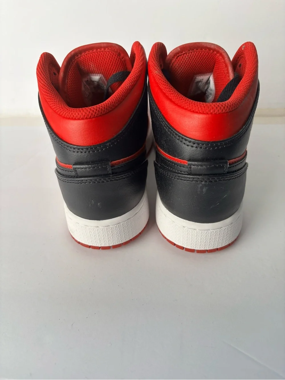Jordan 1 Mid red/black sneakers. Boys size 5.